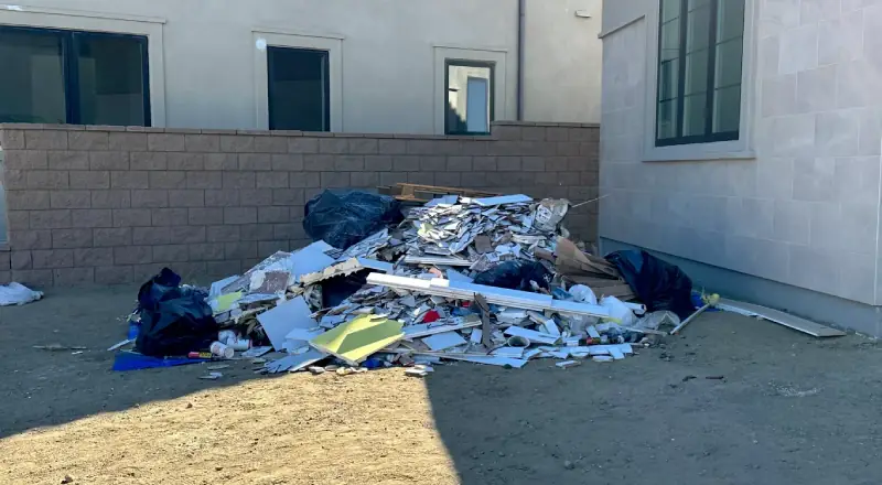 Pile of construction debris and junk before removal